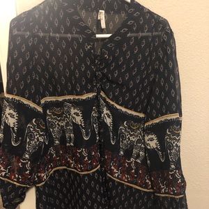 Elephant, elegant see-thru top